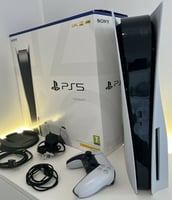 playstation 5 +2 CD ( FC24 , GTA 5 ) et un double chargeur de manettes