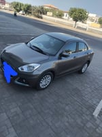 Suzuki Dzire 2024 bon état, climatisation, prix négociable