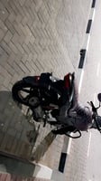 Moto Hero en excellent état, moins d'un an d'utilisation