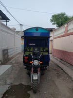 Tricycle professionnel équipé pour transport et commerce