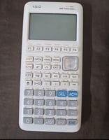 Calculatrice graphique blanche, pour le bac, en excellent état