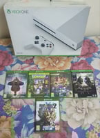 Console Xbox One avec manette et 5 jeux, prix négociable