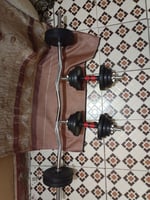 Halt&egrave;re de musculation 30kg en excellent &eacute;tat