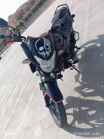 Moto Honda 125 cc, garantie compl&egrave;te incluse, &eacute;tat neuf