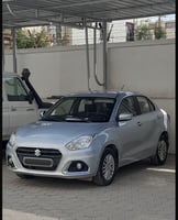 Suzuki Dzire 2024, essence 1.2, automatique, bleu ciel, tout options