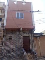 A VENDRE MAISON À Q.2 AVEC TITRE FONCIER