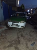 Taxi Toyota Corolla avec climatiseur en très bon état