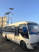 Mitsubishi Rosa 30 places, en bon état, idéal pour transport scolaire ou touristique