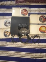 PS3 Slim - Comme Neuf, 2 Manettes, 5 Jeux Inclus