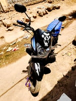 Moto en très bon état, modèle récent