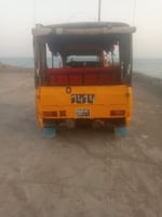 Bajaj Mahindra jaune en bon état