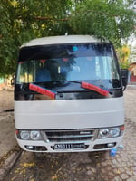bus Mitsubishi rosa 2018