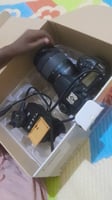Canon 90D avec objectif 18-135 mm, peu utilisé