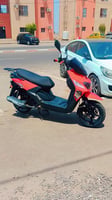 Scooter en excellent état, presque neuf, moins d'un an d'utilisation