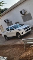 Toyota Hilux Marill blanc, neuf et en bon état