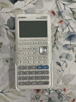 Calculatrice graphique avec programmes Terminale S en bon état