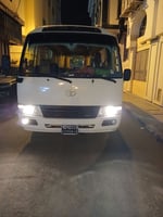 Location bus Toyota Coaster 25 places en bon état