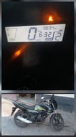 Honda SP125 2023, essence, bon état, noir et vert