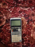 Calculatrice en très bon état pour examen
