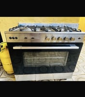 Cuisinière gaz 5 feux avec four en bon état