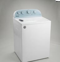 Lave-linge Whirlpool top charge d'occasion en bon état