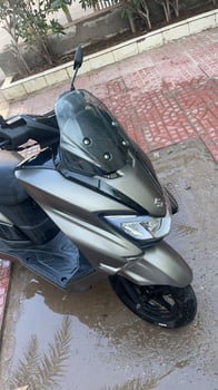 Suzuki Burgman 125cc, comme neuf à vendre