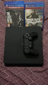 Playstation 4 Slim + 10 jeux + 2 manettes - Très bon état