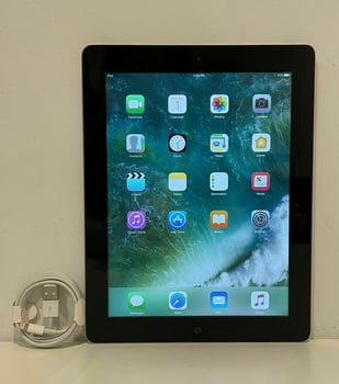 iPad 4th génération, comme neuf avec chargeur inclus