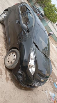 Voiture Chevrolet Spark en bon état, climatisée