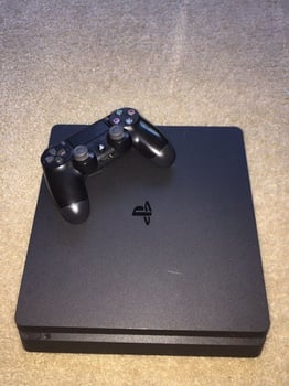 PlayStation 4 Slim + Manette, comme neuf