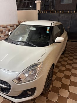 5 Voitures en excellent état à vendre : SUZUKI SWIFT 2022 45000km &. MITSUBISHI L200 automatique 2022 & MARQUE MG 2016 & HYUNDAI VENUE 2022 & Kia SPORTAGE 2012