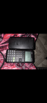 Calculatrice scientifique graphique ASIQ fx-975P en parfait état