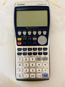 Calculatrice fonctionnelle en bon état