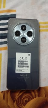 Redmi 14C 128 Go en excellent état, comme neuf