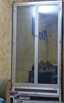 Armoire aluminium avec porte double battants en verre