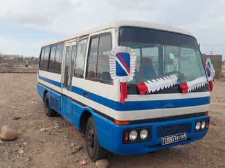 Bus Toyota Coaster en bon état, négociable