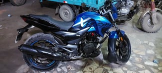 Blue and black Hero 200 motorcycle