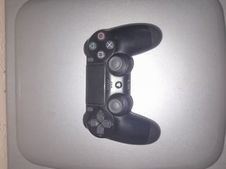 Manette Ps4 en excellent état, fonctionnelle