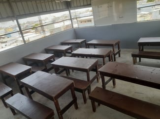 Salle de classe spacieuse pour cours de soutien à Quartier 7