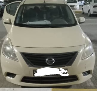 Nissan Sunny 2014, bon état, faible kilométrage, climatisé, négociable