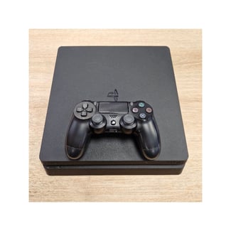 Playstation 4 slim + 1 manette + 2 CD