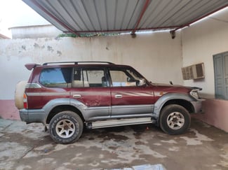 Toyota Prado bordeaux en vente