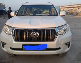 Toyota Prado TXL 2018, diesel, 7 places, équipé d'un mini frigo, excellent état