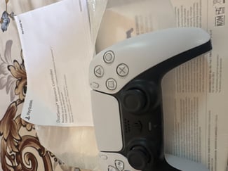 Manette PS5 neuve en provenance du Canada