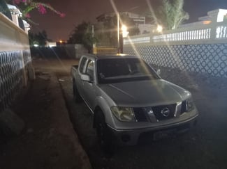 Nissan Navara pickup double cabine, climatisation, très bon état