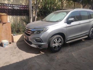 Honda Pilote en excellent état, essence automatique