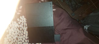 Playstation 2 en excellent état, prix négociable