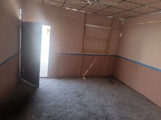 Chambre spacieuse avec toilette et 2 portes avant/arri&egrave;re