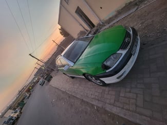 Toyota Taxi en bon état, boîte manuelle, bien entretenu