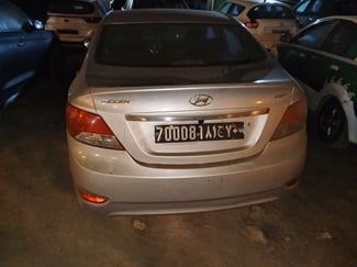 Hyundai Accent 2014 Gris, faible kilométrage, climatisation en bon état